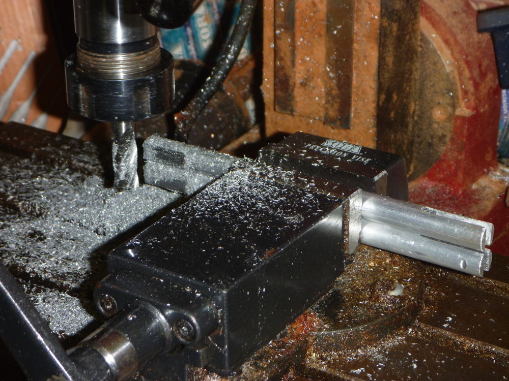 milling tangs on door bolt pushrods