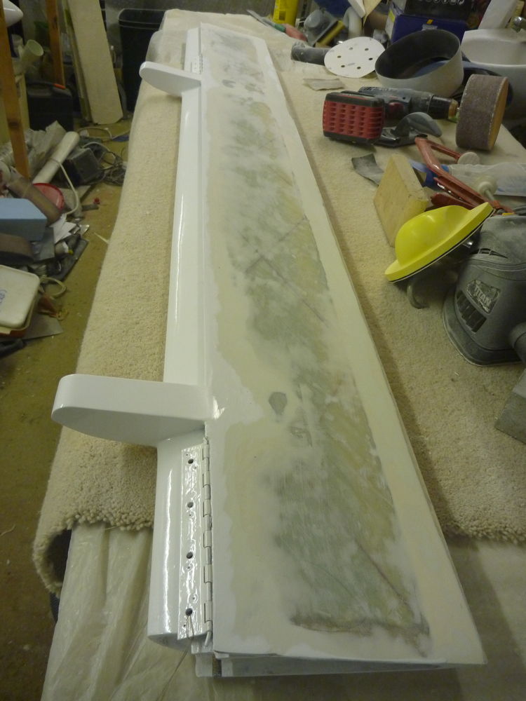 sanding paint and filler off port aileron