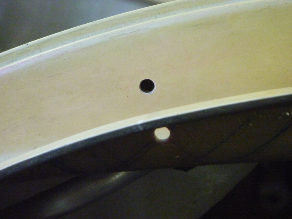 holes drilled for starboard door lower gas strut ball fitting