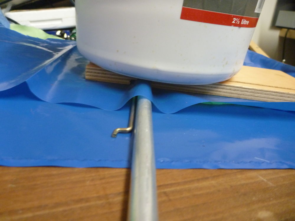 making asymmetric composite tubing clip