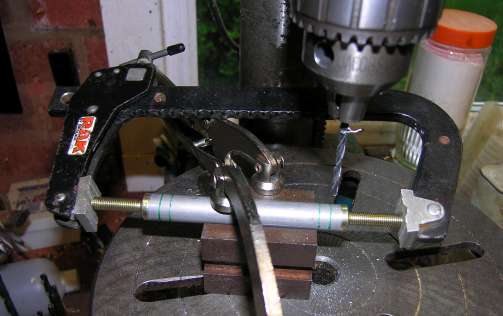 Drilling pushrod ends using vee-blocks