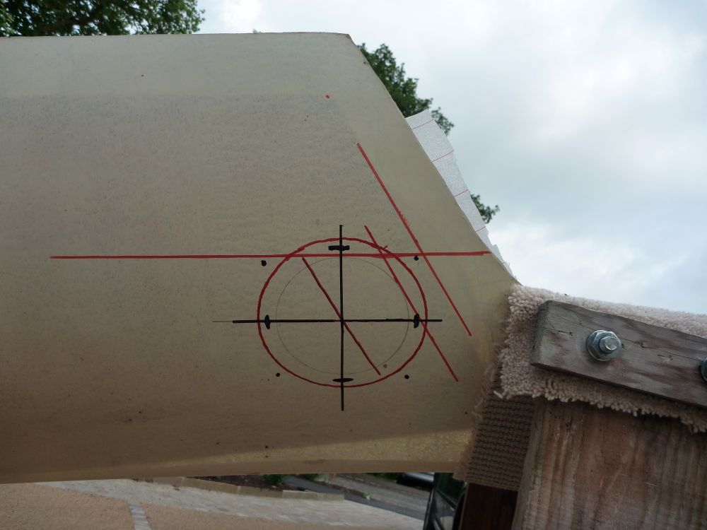 Rear upper access hole marked